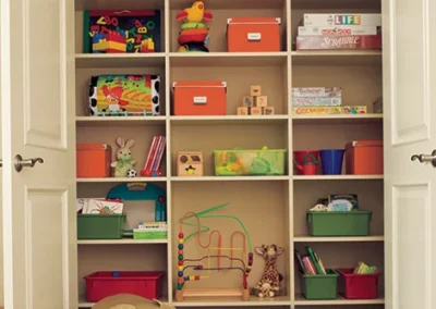 A room with shelves and toys in it